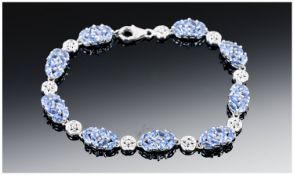 Tanzanite Bracelet, oval clusters of marquise cut stones, 6.6 carats of the rare, single scource