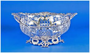 A superb quality large Victorian silver bowl, oval shaped with embossed and pierced foliate detail