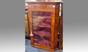 Georgian Mahogany Hanging Corner Cupboard, with plain dentil moulded cornice to top, fitted with