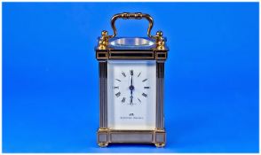 Matthew Norman high quality carriage clock with traditional Swiss accuracy and visible encasement.