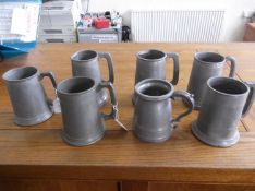 Collection of Seven Pewter Tankards, six with glass bottoms.