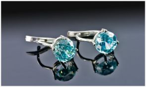 Pair Of White Gold Stud Earrings, Each Set With A Single Blue Zircon Coloured Stone, Approx 1.30ct
