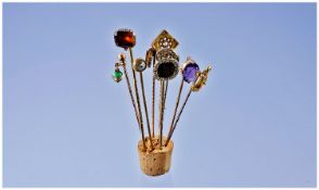 A collection of Victorian stick pins various - 9 in total. Some 9 ct and 15 ct gold pins. Also set