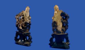 Unusual Coloured Soapstone Figure of a Carved Rocky Base of a Chinese Sage, seated on rocks amongst