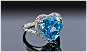 14ct White Gold Diamond Topaz Ring, Set With A Heart Shaped Topaz, (Approx 6.75cts) Surrounded By
