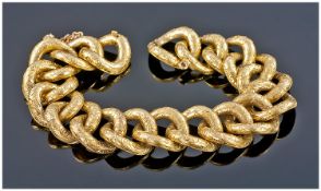 18ct Gold Fancy Link Bracelet Round Concave Links, The Fronts With Scroll Floral Chased Decoration,