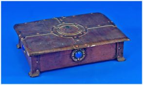 An Interesting Copper Arts and Crafts Lidded Box of large size. The top inlaid with a Celtic cross