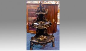 Late Victorian Back Lacquered Papier Mache What Knot, of three-tier graduated form, fitted with