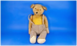 Early To Mid 20thC Straw Filled Teddy Bear. Worn Condition, Height 28 Inches.
