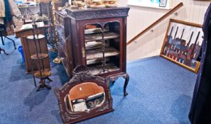 Late Victorian Mahogany Music Cabinet, circa 1890, elaborately carved with scrolling acanthus