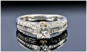 Fine Quality White 18ct Gold Set Single Stone Princess Cut Diamond Ring with diamond shoulders.