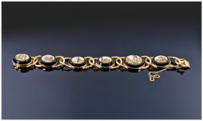 18ct Gold Mounted Micro Mosaic Bracelet Six Oval Onyx Discs Depicting Italian Ruins/Buildings.