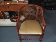 Late Victorian / Edwardian Tub Chair, with original canework to back and sides, fitted with a drop-