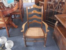 Early Twentieth Century Beech Framed Ladder Back Armchair with Rush Seat.