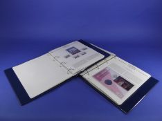 2 Padded Royal Family Albums, with lots of special and numismatic covers. 40th Anniversary stamps