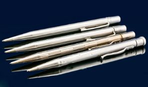 Yard o Led Silver Cased Propelling Pencil. A Collection of Four Pens in total. Fully hallmarked for