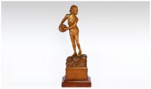 William Inglis Day  Art Deco Hand Carved Wooden Sculpture Of A Young Woman wearing a gym slip,