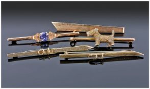 Collection Of Five Bar Brooches, One With Applied Terrier Dog, Two In The Form Of Skis, One Plain
