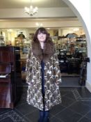 Ocelot Piece Coat with Arctic Fox Collar, the ocelot pieces arranged in honeycomb fashion to the A-