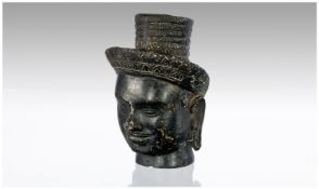 A Small South East Asian bronze Casting of a Buddah head.