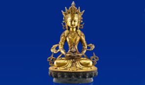 Tibetian Bronze Of A Seated Buddha. 12`` in height.