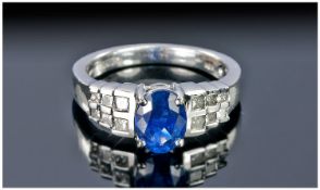 Fine Quality 18ct White Gold Set Single Stone Ceylon Blue Oval Sapphire Ring with princess cut