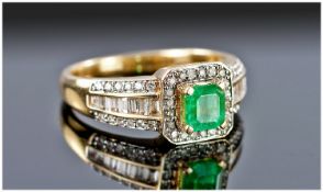 18 Carat White Gold Set Emerald and Diamond Cluster Ring. The single square shaped natural emerald