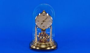 German Anniversary Clock with glass dome, 9.5 inches in height.