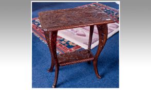 Early 20th Century Japanese Style Carved Occasional Table, with an ornately carved top with moulded