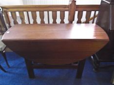 Modern Mahogany Drop Leaf Table, hand crafted, of two leaf form, measuring 29 inches high, 48 wide