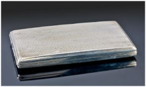 A Good Quality Continental Silver Ladies Cigarette Case. Fine engine turned case with silver gilt