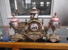 Sevres Style Porcelain Gilt Metal Clock Garniture, Pink And White Dial, Panels And Urns, Lion Mask