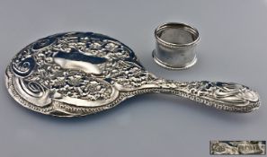 Silver Dressing Table Hand Mirror, Together With a Napkin Ring.