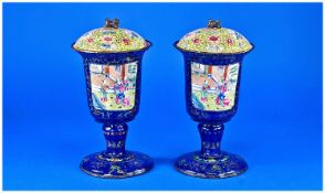 A Matching Pair of Eighteenth Century Cantonese Enamel Libation Cups with covers. Decorated panels