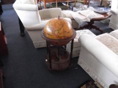 Modern Cocktail Cabinet in the form of a globe, 35 inches high.