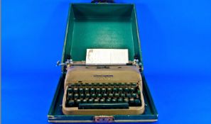 `New Reminton` Travel-Riter Vintage Post War Typewriter in case including Handbook.