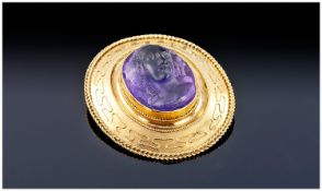 Carved Amethyst Cameo Brooch. The Oval-Shape Amethyst, Carved To Depict The Profile Of A Lady,