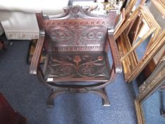Arts and Crafts Style Carved Hall Chair, of X framed form, with elaborately intertwined back and a