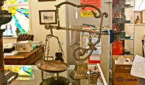 Large Brass Weighing Scales, together with a case of graduated measures.