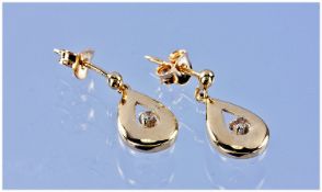 Pair Of 9ct Gold Diamond Set Drop Earrings.
