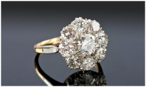 Very fine 1930`s 18ct gold and platinum diamond cluster ring. Flowerhead design diamonds of good