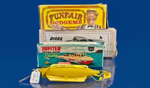 Three Boxed Toys, Comprising A Sutcliffe Model ``Jupiter`` Clockwork Ocean Pilot Cruiser, Sutcliffe