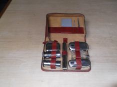 Mid 20th Century Gentleman`s Toiletry Case, leather, opening to reveal two silver plated backed