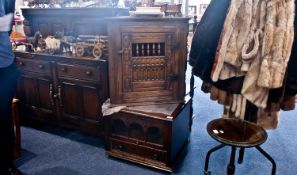 Small Oak Hanging Corner Cupboard, in the priory style, with turned spindles to door, together with