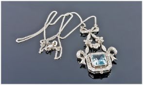 18ct white gold very fine diamond and aquamarine set pendant drop supported on 18ct white gold