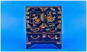 Small Japanese Lacquered Miniature Cabinet, 12 inches in height.