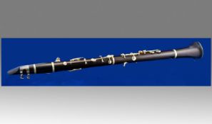 Ebony Victorian Clarinet In Leather Case. unsigned. Case has inscription `London` and indistinctive