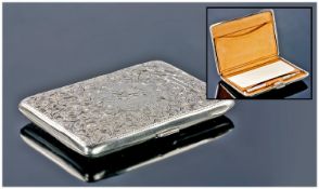 A fine quality very early Edwardian solid silver Aide Memoire. The hinged case chased with leaves