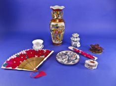 A Collection of Seven Pieces of Modern Oriental Pottery, comprising of a vase, tea cup and saucer,