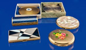 Six Various Compacts, including Art Deco style enamelled geometric compact, two boxed compacts and